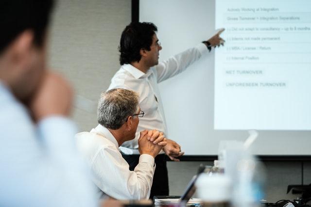 A man running through a PowerPoint presentation