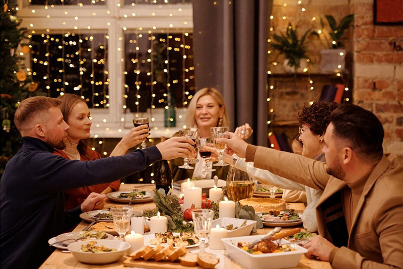 People sat down for a christmas meal