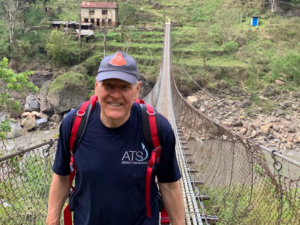 Nick Cragg crossing a bridge