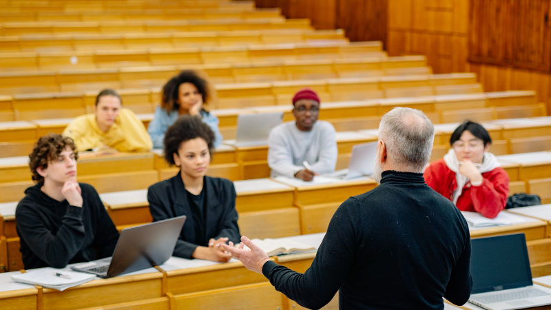 Lecturer leading a session with students