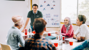 Group of professionals sat together, collaborating with their ideas