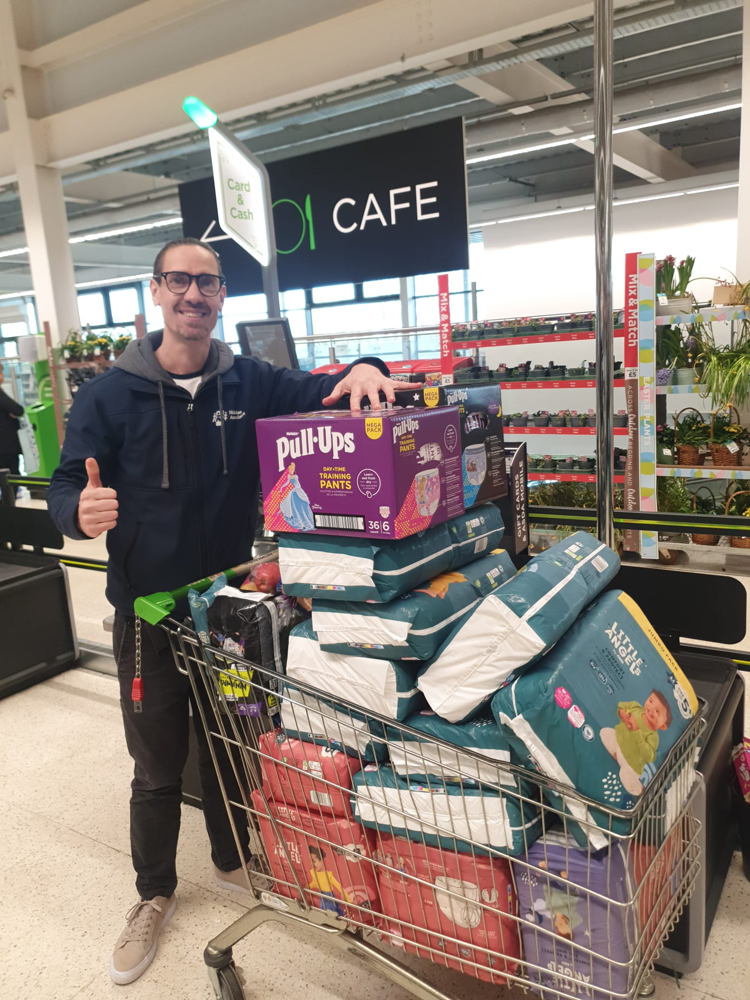 James purchasing nappies to donate to the local support centre