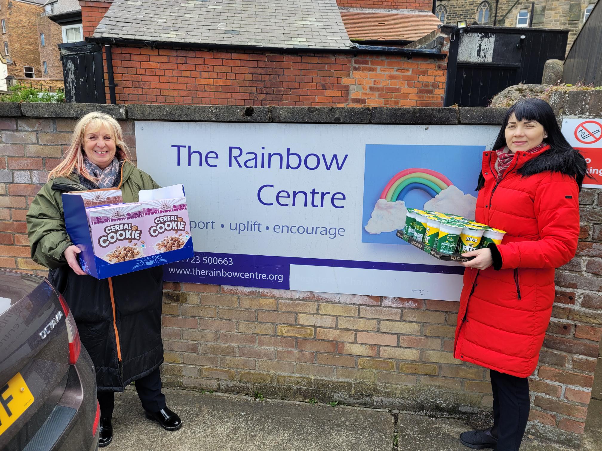 Trina and Roxana dropping off their donation to the Rainbow Centre