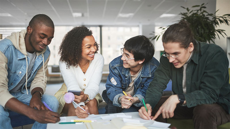 University students sat together studying
