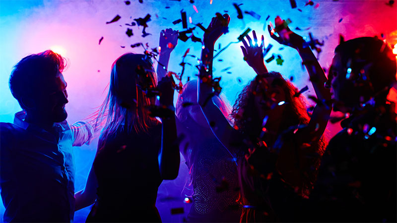 Students dancing in a nightclub