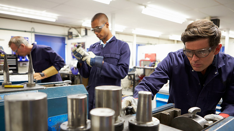 Busy interior of engineering workshop