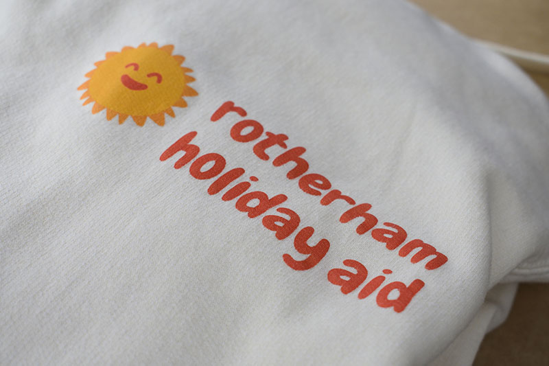 Close up of Rotherham Holiday Aid Jumper